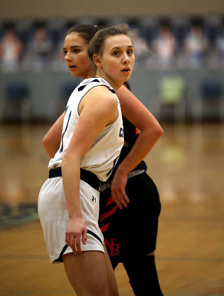 Tolton guard Grace Schieber and Avery Nichols cross paths